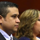 George Zimmerman with Shellie Zimmerman (Pool/Getty Images)